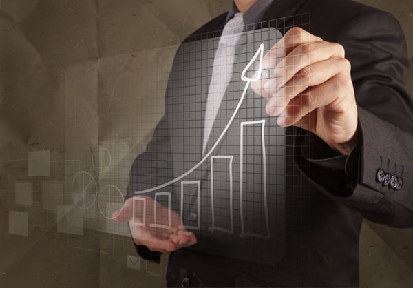 businessman hand draws business strategy with crumpled recycle paper background as concept